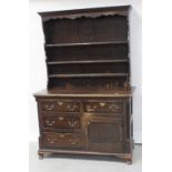 A 19th pine stained dresser of small proportions,