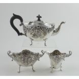 A Victorian hallmarked silver bachelor's tea service, teapot,