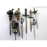 Five novelty letter openers and three novelty pastis pourers (8).