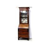 An Edward VII mahogany and satinwood cross-banded elevated bureau bookcase,