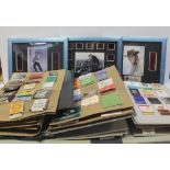 A collection of mid/late 20th century match books and framed Elvis memorabilia in the form of 35mm