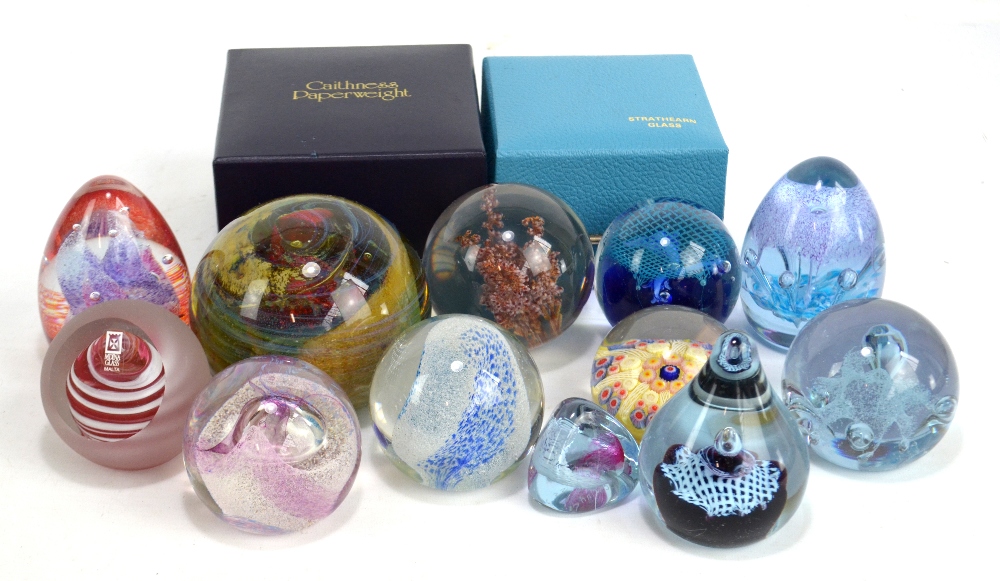 A collection of glass paperweights including Mdina and Caithness.Additional InformationSome