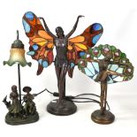 Three Art Deco styled lamps to include a figure dancing with butterfly wings, height 51cm, a similar