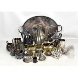 A group of silver plated items and further metalware including teapot, ewer, sauce boat, etc.