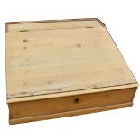 A pine table top desk, width approx 62cm.