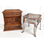 A Victorian carved oak table top cabinet, with moulded top above two frieze drawers and two carved