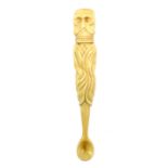 An unusual Victorian marine ivory corkscrew or pipe tool, the terminal modelled as a skull