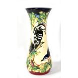 MOORCROFT; a tube line decorated 'Inglewood' pattern waisted vase, signed by Phillip Gibson with