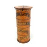 A Victorian four tier spice tower, each section labelled 'Mace', 'Cloves', 'Cinnamon' and 'Nutmegs',