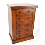 A Victorian mahogany miniature Wellington chest, with five central drawers, raised on plinth base,