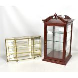 A modern mahogany glazed three shelf table top display cabinet, height 54cm, also a brass mirror