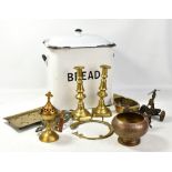 A group of brass ware and an enamel bread tin with lid.