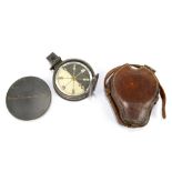 STANLEY; a leather cased brass circular pocket compass with paper dial, the cap inscribed 'Stanley