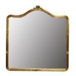 A modern gilt framed wall mirror, the gilt frame with linear decoration and central swags of