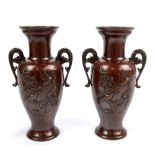 A pair of Meiji period bronze twin handled vases, height 24cm.