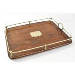 An early 20th century oak butler's tray with silver plated mounts, length 47cm.