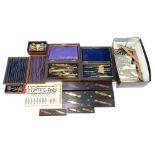 A collection of drawing instruments including part complete set in fitted box, parallel rules with