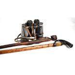 CARL ZEISS; a pair of 'Jena' 10 x 50W binoculars and two walking sticks, the first with carved