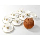 ROYAL WORCESTER; a part coffee service with printed Football Association device and gilt rims