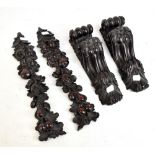 A pair of Victorian carved leaf and bud furniture mounts, height 40cm and a similar carved pair of