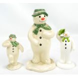 ROYAL DOULTON; a ceramic 'The Snowman' money box, a small figurine example dancing, a Coalport