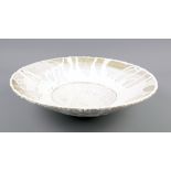 AKIKO HIRAI (born 1970); an open stoneware bowl decorated with running white glaze, incised AH mark,