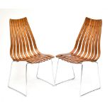 HANS BRATTRUD HOVE MOBLAR (Norway); eight rosewood Scandia chairs, each raised on chrome supports,