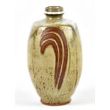 JIM MALONE (born 1946); a stoneware bottle covered in green ash glaze with nuka top and wax resist