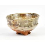 CHARLES BOUND (born 1939); a wood fired footed bowl, impressed marks, diameter 16.5cm.Additional