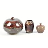 JOHN CHRISTIE (born 1947); a miniature raku vase, impressed JC mark, height 6cm, another Pantasaph