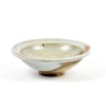 SVEND BAYER (born 1946); a stoneware footed bowl, diameter 17.5cm, and a book 5 Devon Potters by