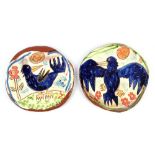 BEN FOSKER (born 1960); a near pair of slip decorated earthenware plates depicting rooks, largest