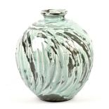 ALEX SHIMWELL (born 1980); a stoneware vase covered in porcelain slip and celadon glaze with dark