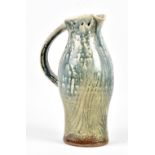 LISA HAMMOND (born 1956); a salt glazed leaning jug, incised and impressed marks, height 29cm. (D)