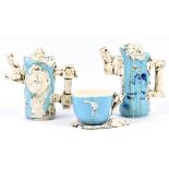 MATTHEW DAVID MARSH; a porcelain coffee pot, tea pot and cup and saucer, textured with print,