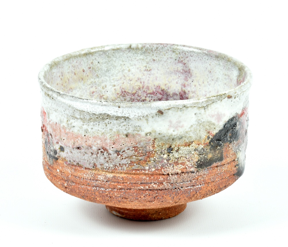 ROBIN WELCH (born 1936); a stoneware chawan, textured and incised surface covered in white glaze