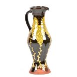 HANNAH McANDREW (born 1977); a tall slipware jug, impressed HM mark, height 36.5cm. (D)