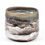 ROBIN WELCH (born 1936); a stoneware yunomi covered in white and purple glaze with gold rim,