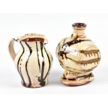 DYLAN BOWEN (born 1967); a slipware flask, incised signature, height 14.5cm, and a jug (2). (D)