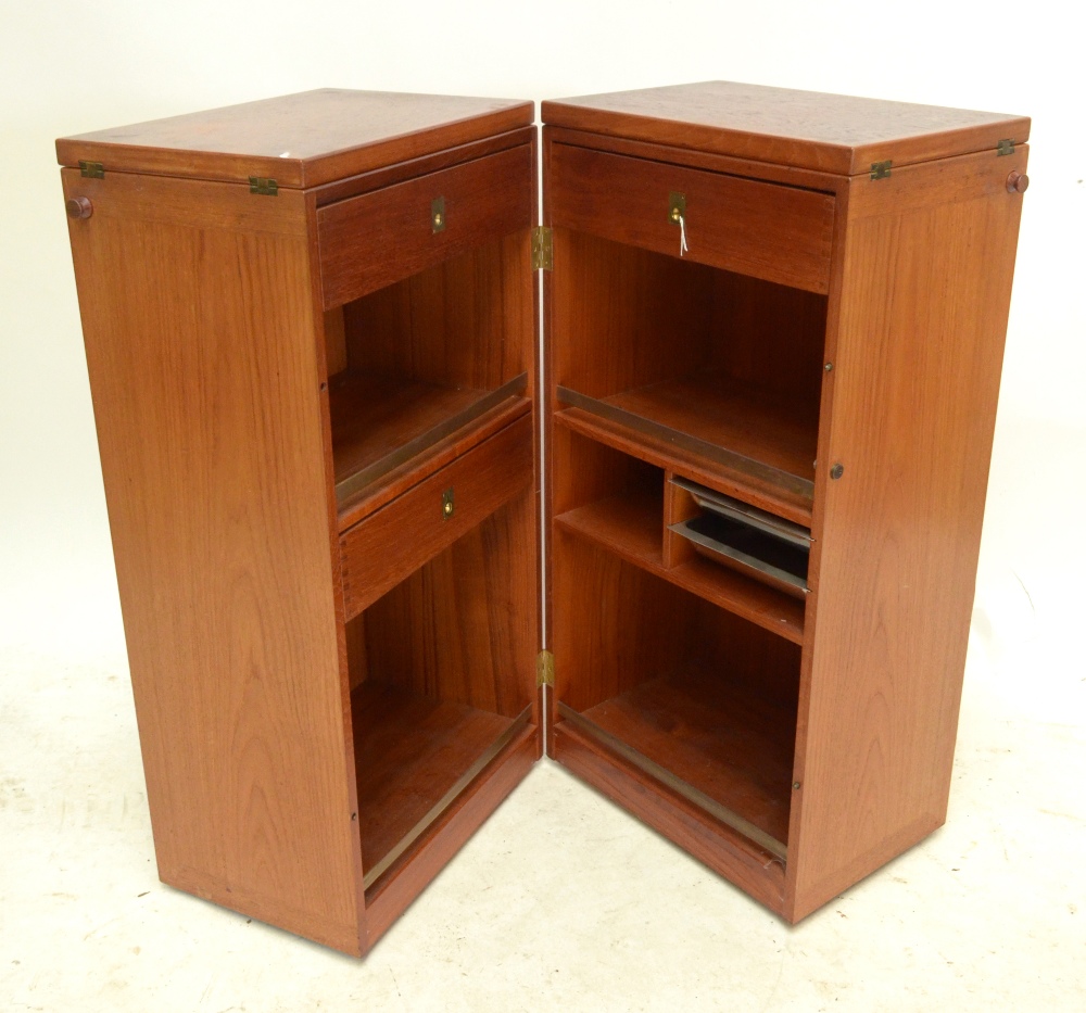 RENO WAHL IVERSEN FOR DYRLUND; a teak metamorphic captain’s bar with two cupboards enclosing