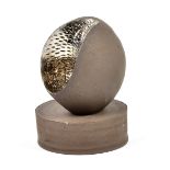 MATT SHERRATT (born 1969); 'Ping', carved black clay with platinum lustre mounted on ceramic base,