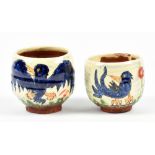 BEN FOSKER (born 1960); a near pair of slip decorated earthenware yunomi depicting rooks, painted
