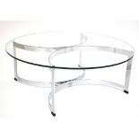 RICHARD YOUNG FOR MERROW ASSOCIATES; a glass topped coffee table raised on chrome base, circa