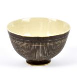 LUCIE RIE (1902-1995); a stoneware footed bowl with sgraffito decoration, impressed LR mark,