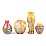 OKRA; two 'Eiger' vases and a ginger jar on mottled yellow grounds, height of vase 21.5cm, and a red