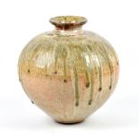 ALEX SHIMWELL (born 1980); a stoneware vase covered in shino and ash glaze, impressed S mark, height