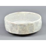 AKIKO HIRAI (born 1970); a faceted stoneware footed bowl covered in white glaze, diameter 22.5cm.