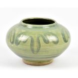 PERCY BROWN (1911-1996); a stoneware squat vase covered in green glaze with cobalt decoration,