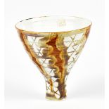 MARIANNE DE TREY (1913-2016); a porcelain stem cup with iron decoration, original price label,