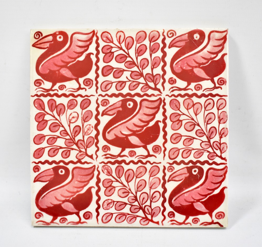 WILLIAM DE MORGAN; a rare lustre glazed square sectioned tile decorated with alternate panels of